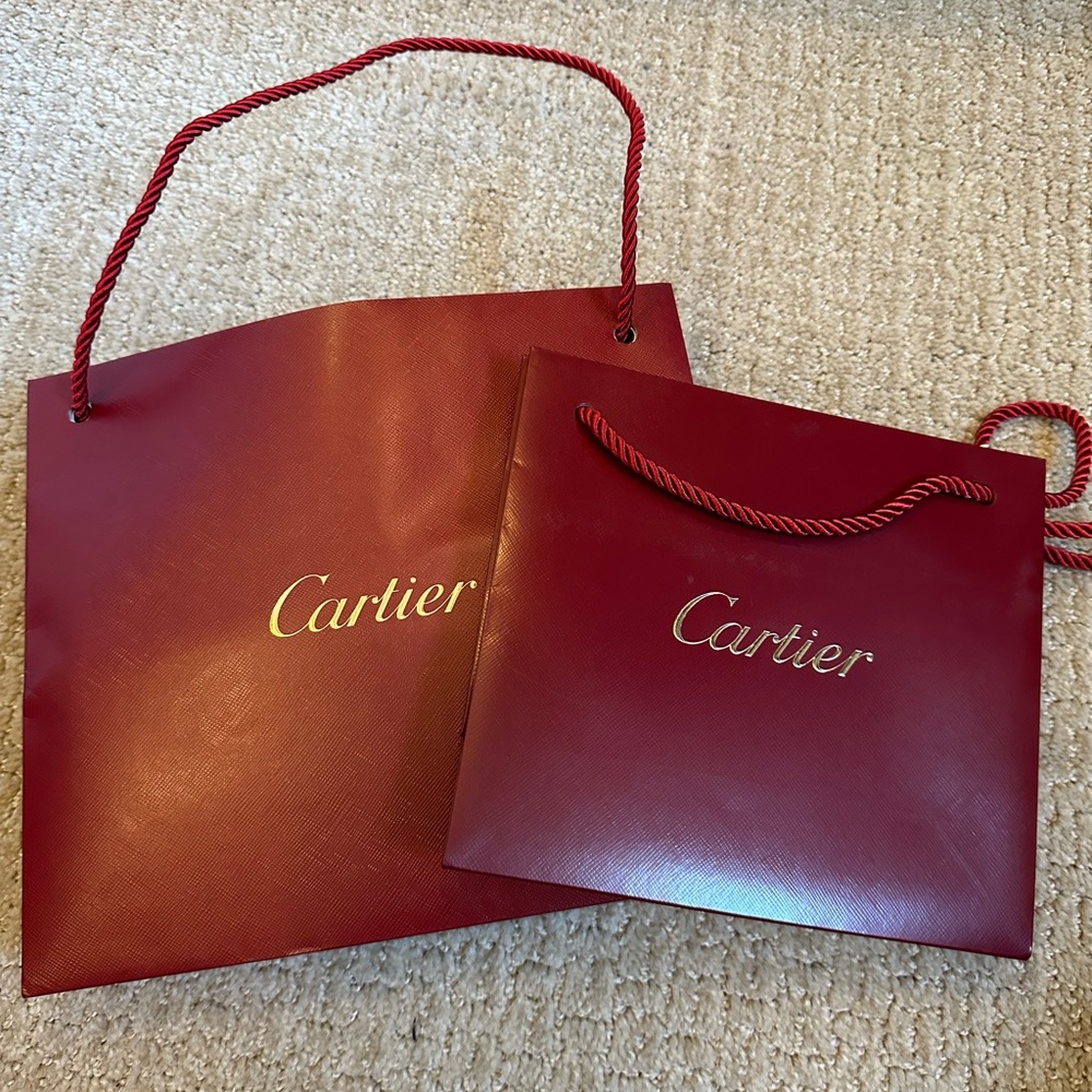Cartier Red Shopping Bags with Glossy Finish and Gold Accents
